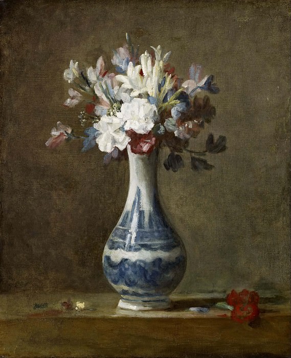 flowers in blue and white vase