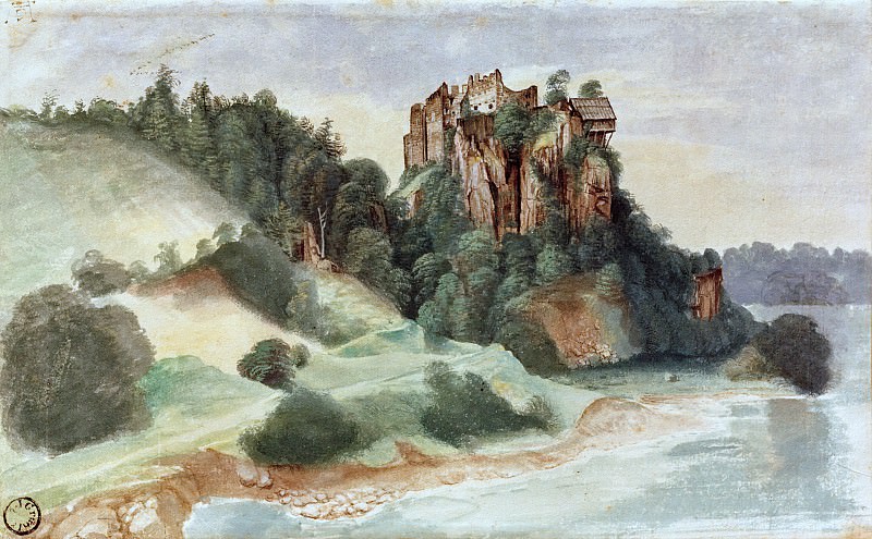 View of a castle overlooking a river
