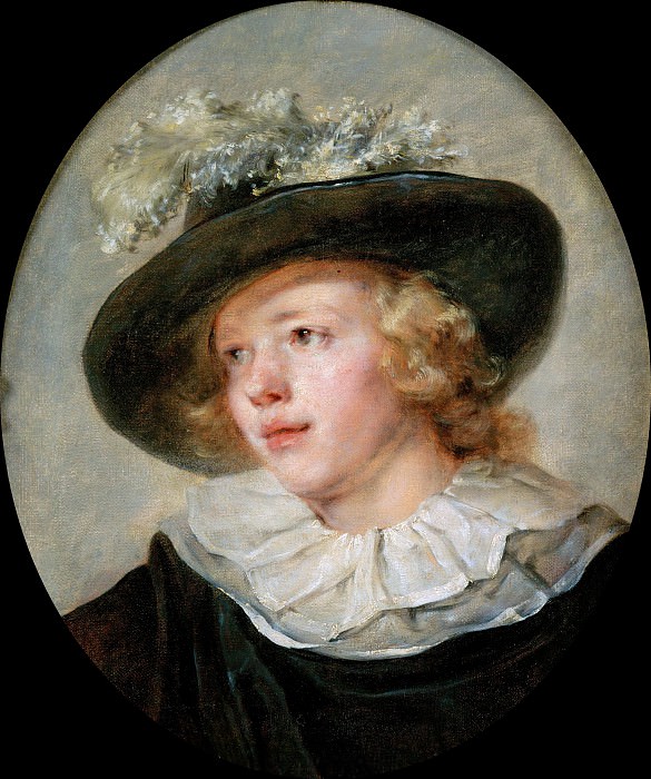 Portrait of young boy with a feathered hat