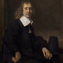 Молодой человек сидящий за столом, Рембрандт Харменс ван Рейн