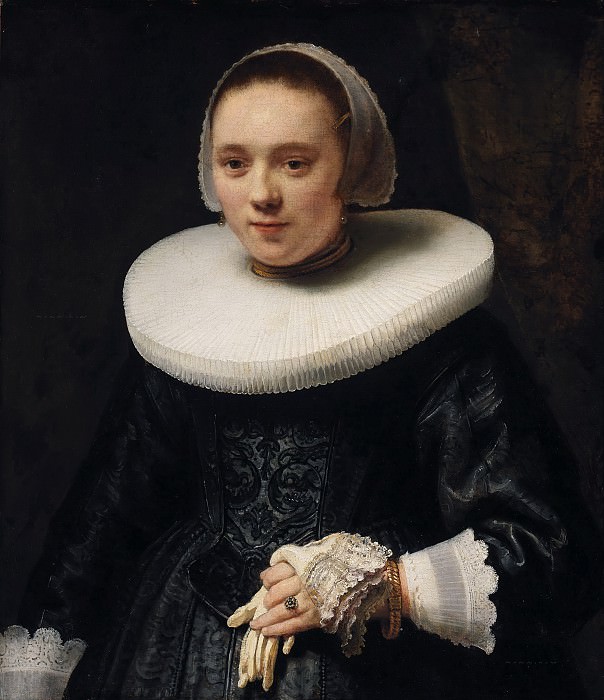 Portrait of a woman holding a glove [circle]