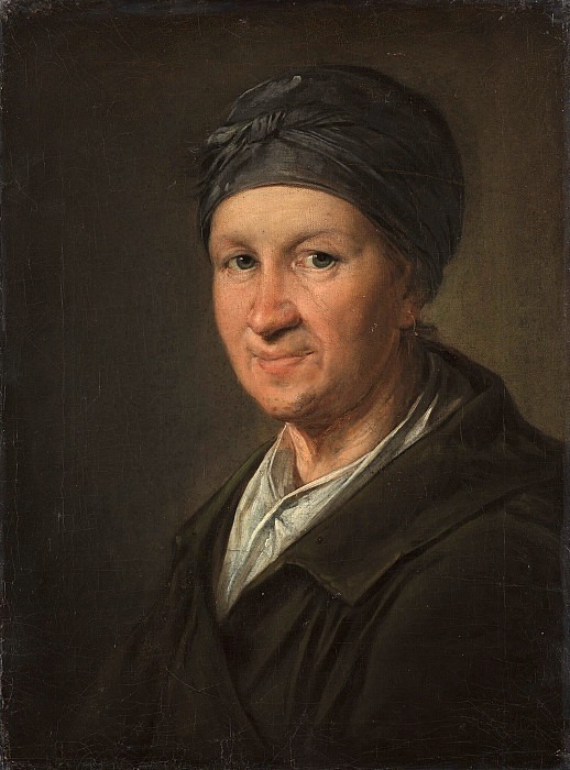 Portrait of a woman with a povoinik on the head