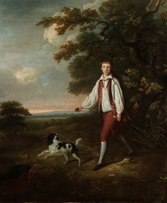 Portrait of a youth holding a cricket bat and ball with his pet black and white springer spaniel. Hugh Barron