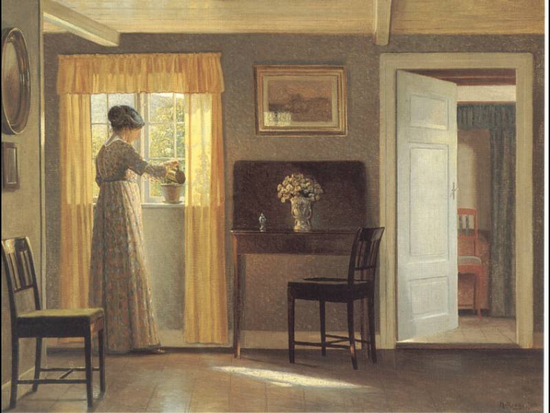 A Lady Watering A Plant By A Window. Alfred Broge