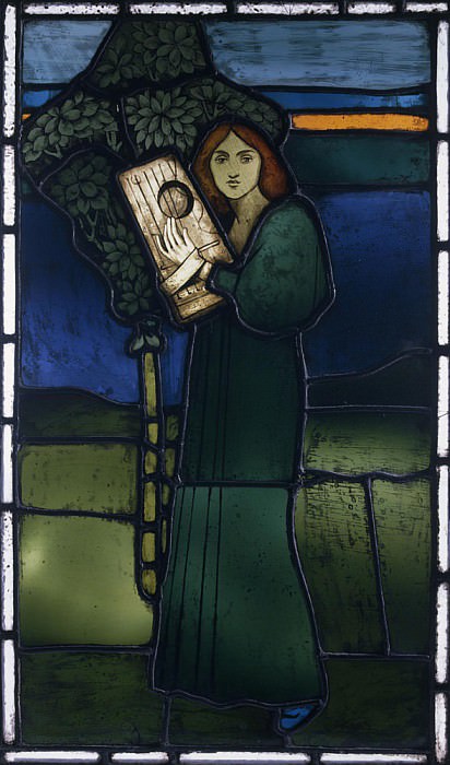 A leaded glass panel depicting a full-length female figure playing a stringed instrument. David Gauld