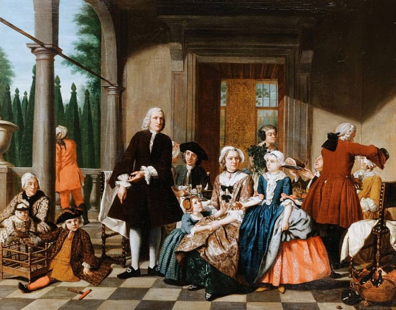 Portrait of a Family dining on a Portico, a formal Garden beyond. Jan Josef Horemans