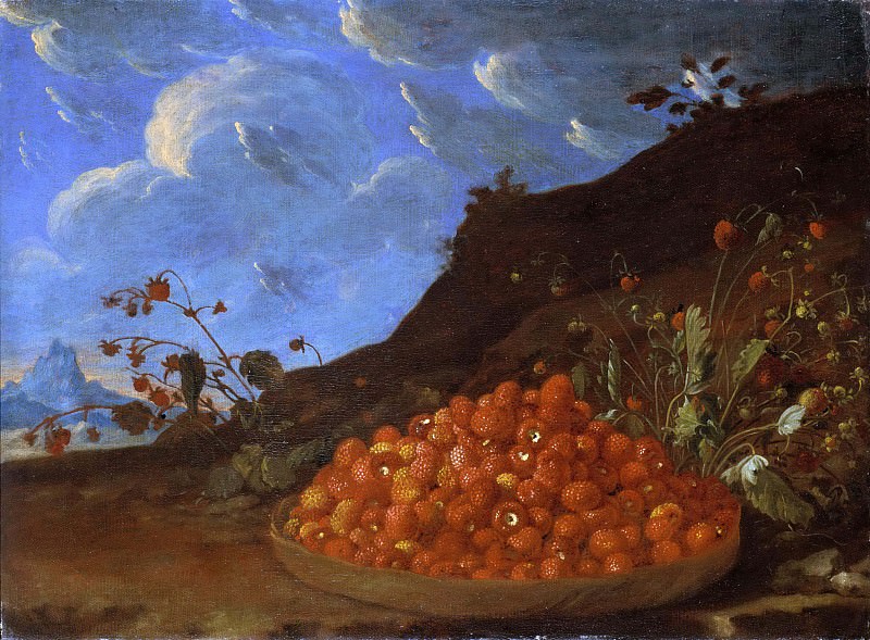 Basket with wild strawberries in a landscape