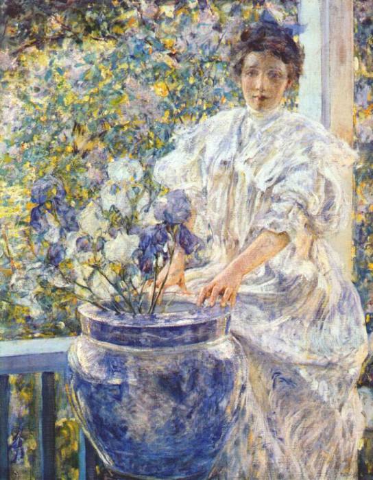 reid woman on a porch with flowers c1906. Reid