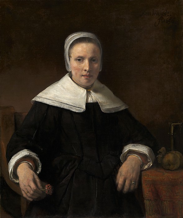 A Woman Holding a Pink. Rembrandt Harmenszoon Van Rijn