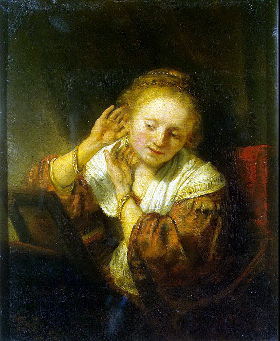 Rembrandt, Harmenszoon van Rijn - A young woman trying on earrings. Hermitage ~ part 10